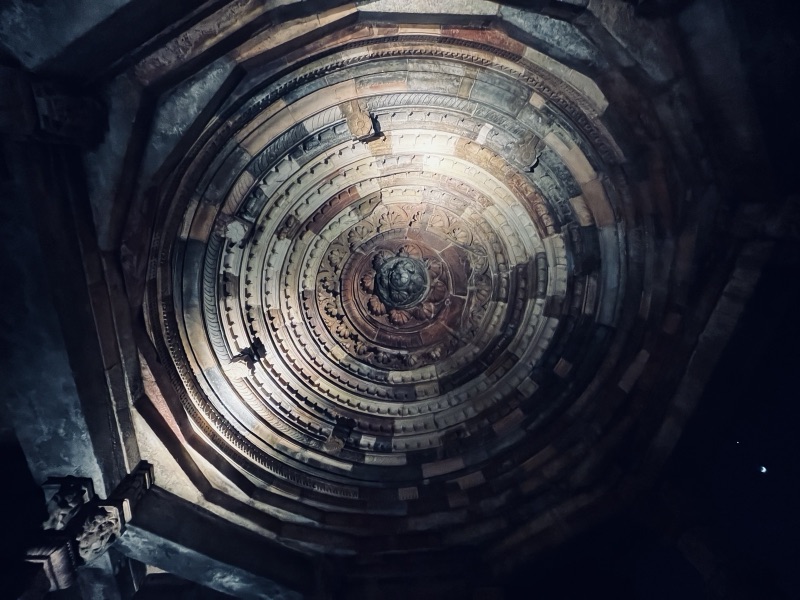 Ornate concentric stone dome ceiling inside Qutub Minar complex, Delhi
